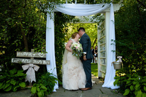 ancaster mill wedding ceremony decor arbour draping