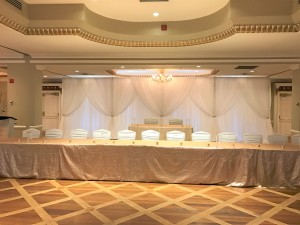 queens landing wedding head table backdrop