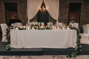 stone mill inn wedding decor head table backdrop