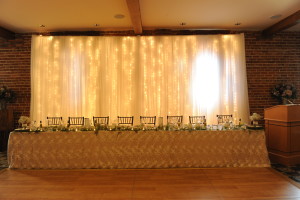 Pillar and post wedding decor head table backdrop