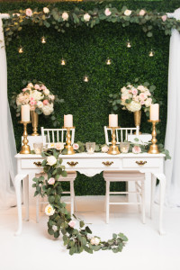 wedding decor boxwood backdrop gold candle sticks vintage table