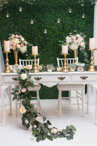 wedding decor boxwood backdrop gold candle sticks vintage table