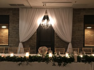 stone mill inn wedding decor head table backdrop