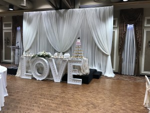 liuna station wedding head table backdrop