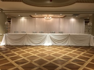 queens landing wedding head table backdrop