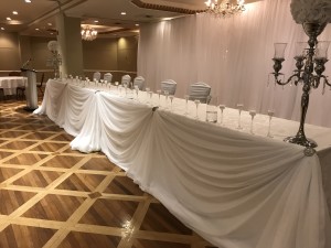 queens landing wedding head table backdrop